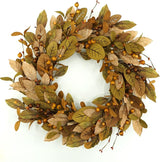 20-inch fall wreath adorned with brown magnolia leaves and small pomegranate berries, suitable for home, outdoor, farmhouse, porch, wall, and window decorations. Comes in a brown gift box.